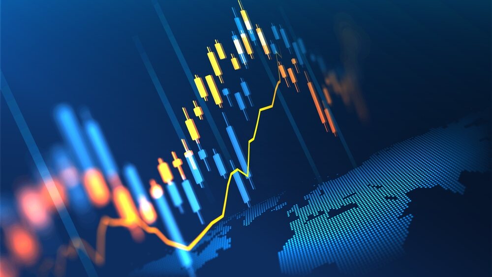 A concept image showing a candlestick chart above a digitized world map.